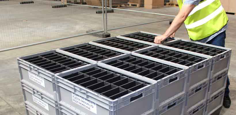 Returnable packaging containers