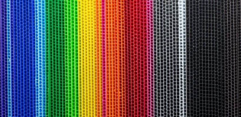 Corrugated plastic with fluting on show in many colours.