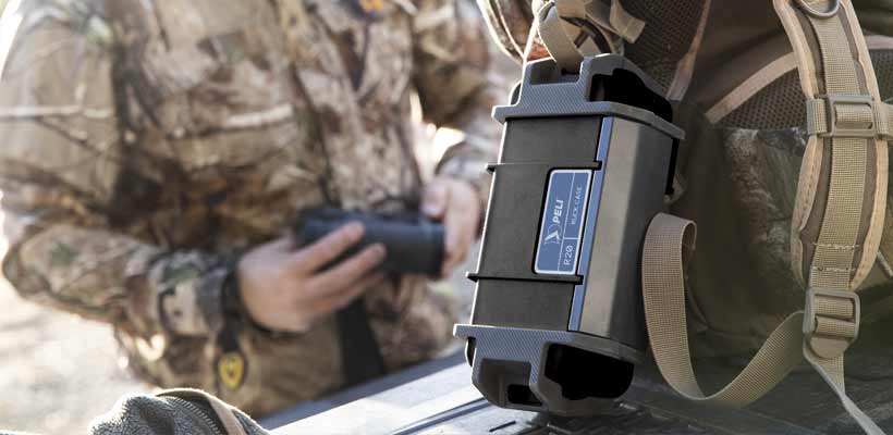 A mini Peli case attached to a larger rucksack
