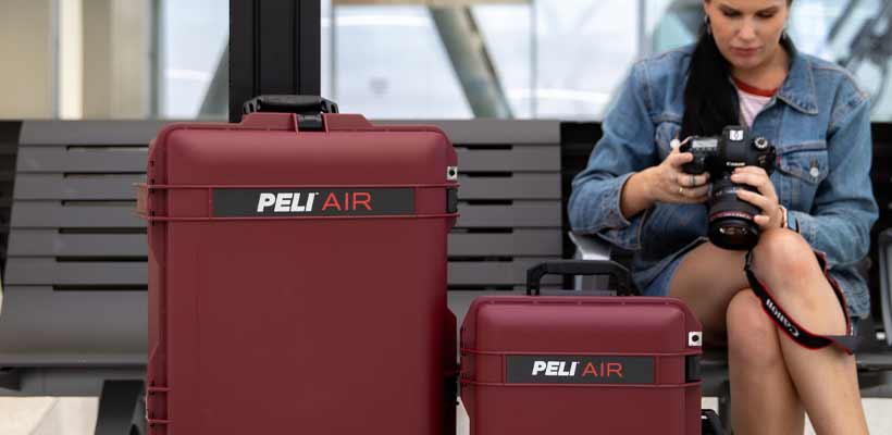 Peli Air A woman with Peli Air cases in an airport.