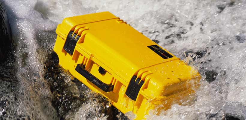 A Storm waterproof case in fast flowing water