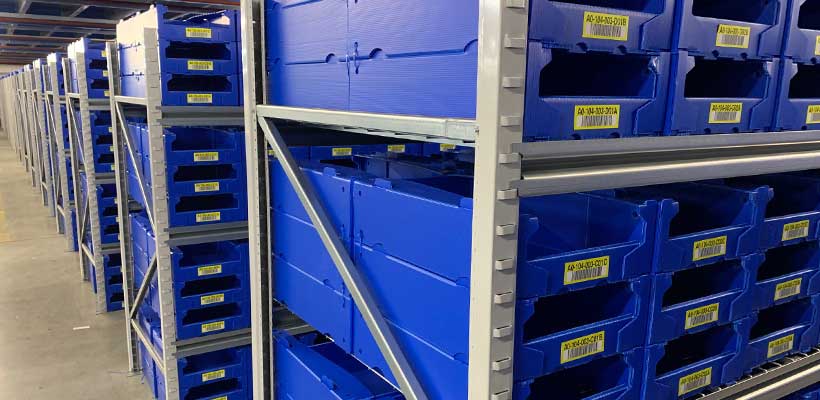 Quick commerce picking bins A warehpuse of picking bins used for quick-commerce fulfilment