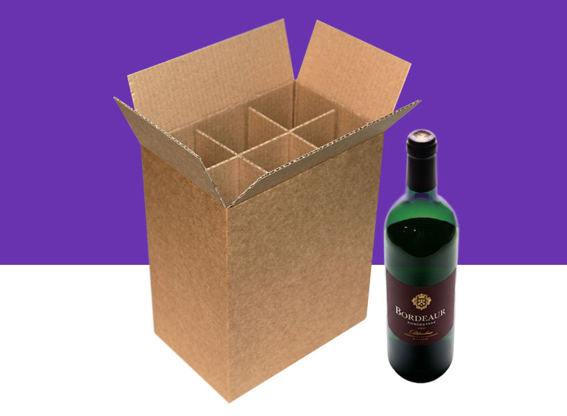 A bottle box with dividers next to a bottle of red wine.