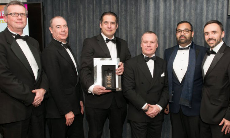 Starpack award winners GWP Packaging employees (from left) David Mason, Bill Chapman, Mike Poynter, Jay Daggar and Matt Dobson, with the Starpack award