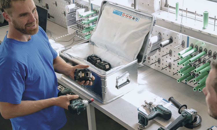 Lithium battery packaging regulations A person loading tools into lithium battery packaging