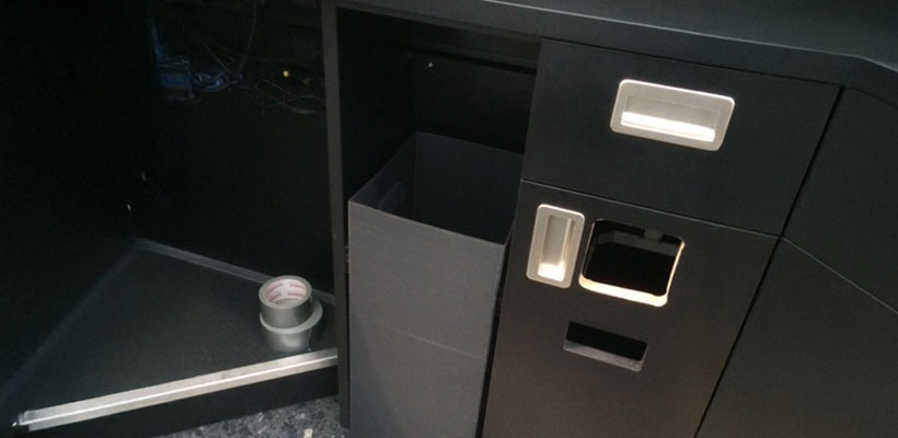 Correx waste bin under a desk