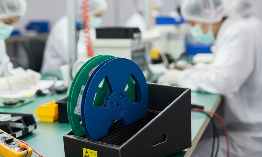 Conductive reel storage in an electronics factory