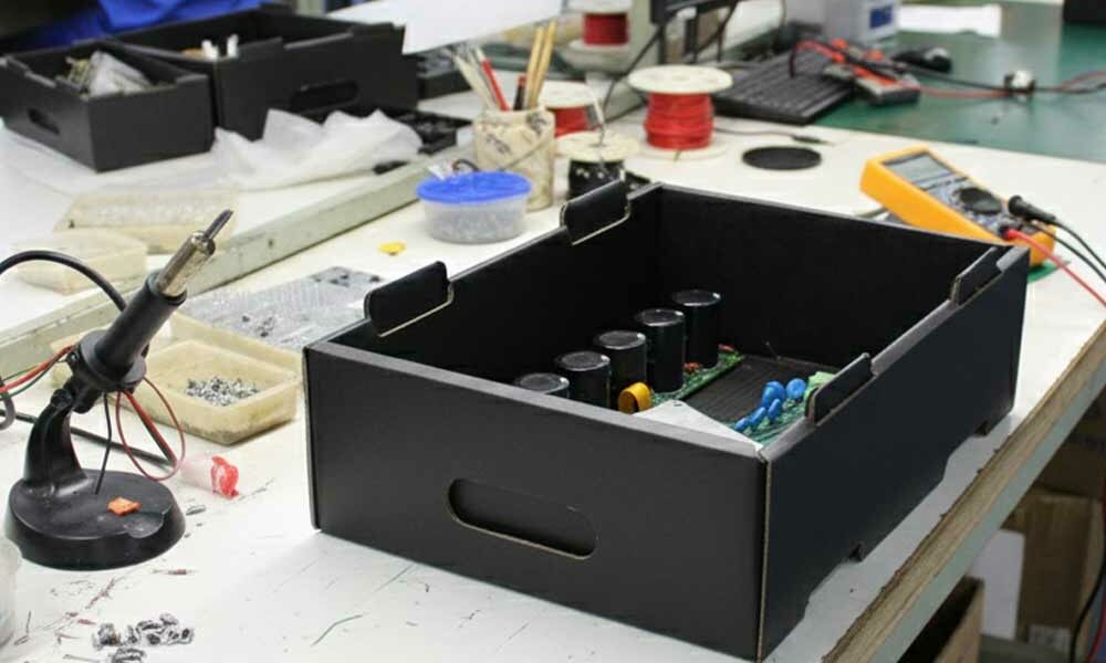 ESD tote box An ESD tote box on a workbench in an electronics factory